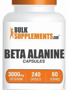 White beta-alanine supplement capsules arranged on a table beside a workout schedule