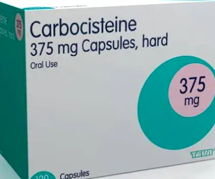 A single 375 mg carbocisteine capsule displayed in a plastic bottle against a dark background