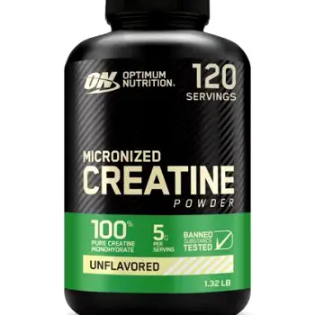 Bottle of creatine monohydrate powder