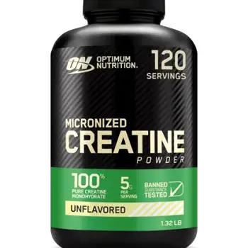 Bottle of creatine monohydrate powder