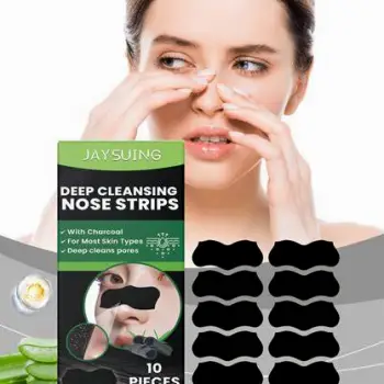 Person gently washing their nose with a facial cleanser and water using light pressure