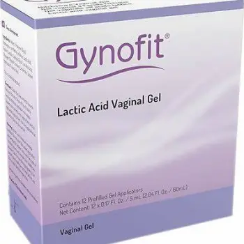 Tube of lactic acid vaginal gel lying next to its applicator on a clean surface