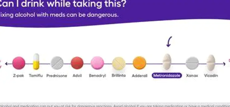 Person holding their stomach with a hand while looking uncomfortable to represent nausea as a common metronidazole side effect