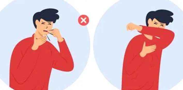 Person covering their mouth and nose with the inside of their elbow while coughing.