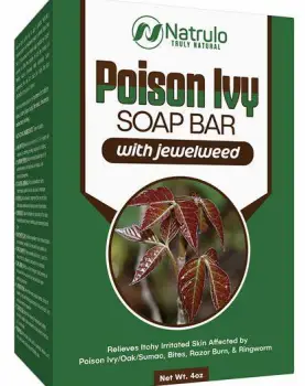 Person washing arm with soap and cool water in a sink to remove plant oil